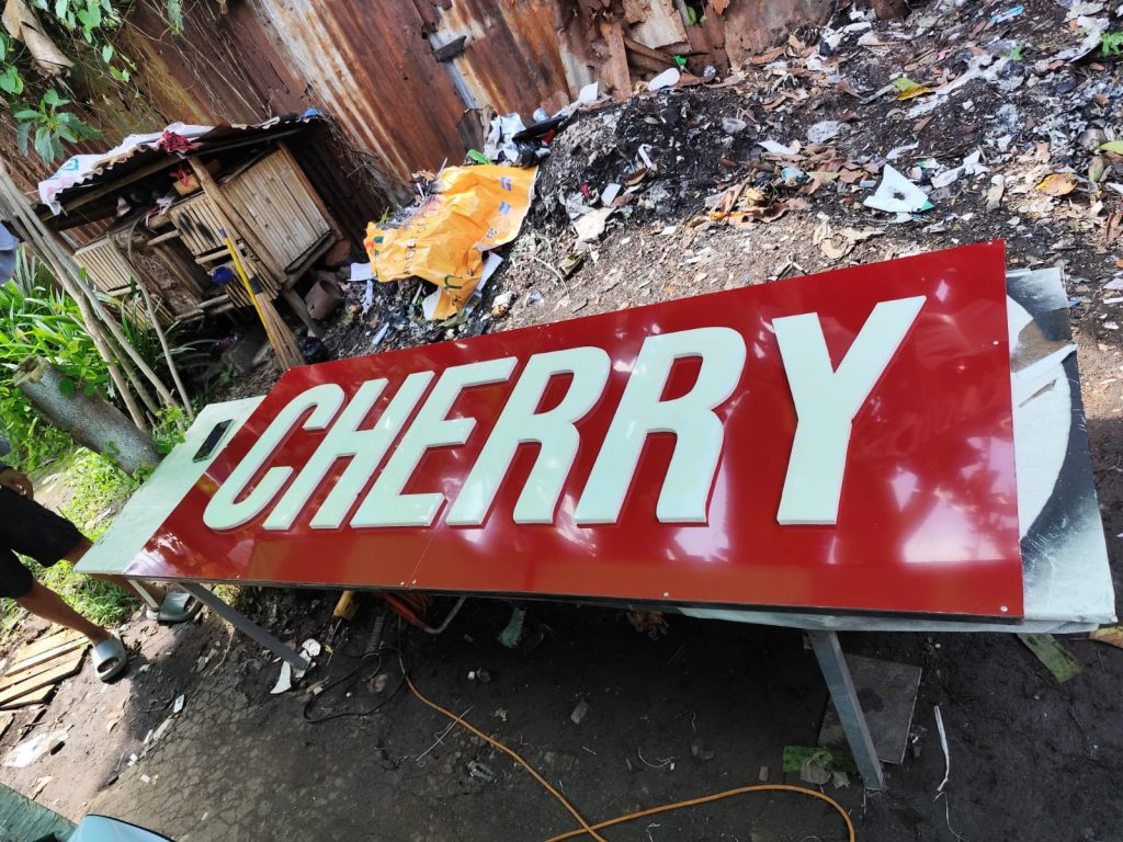 papan nama akrilik manado